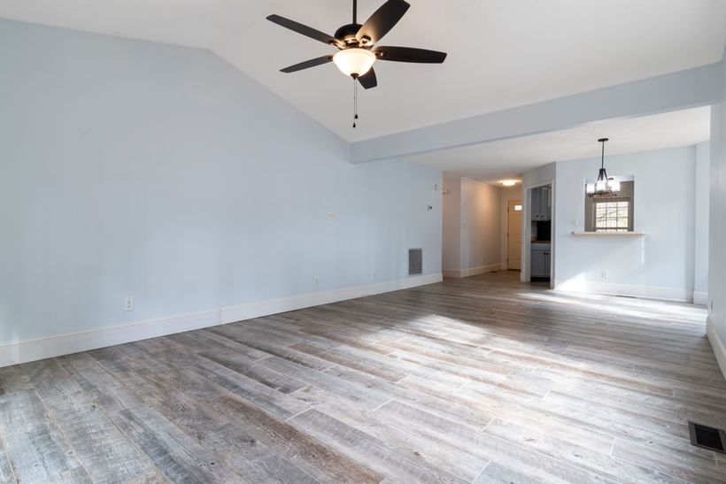Ceiling fan in a warm, softly lit living room