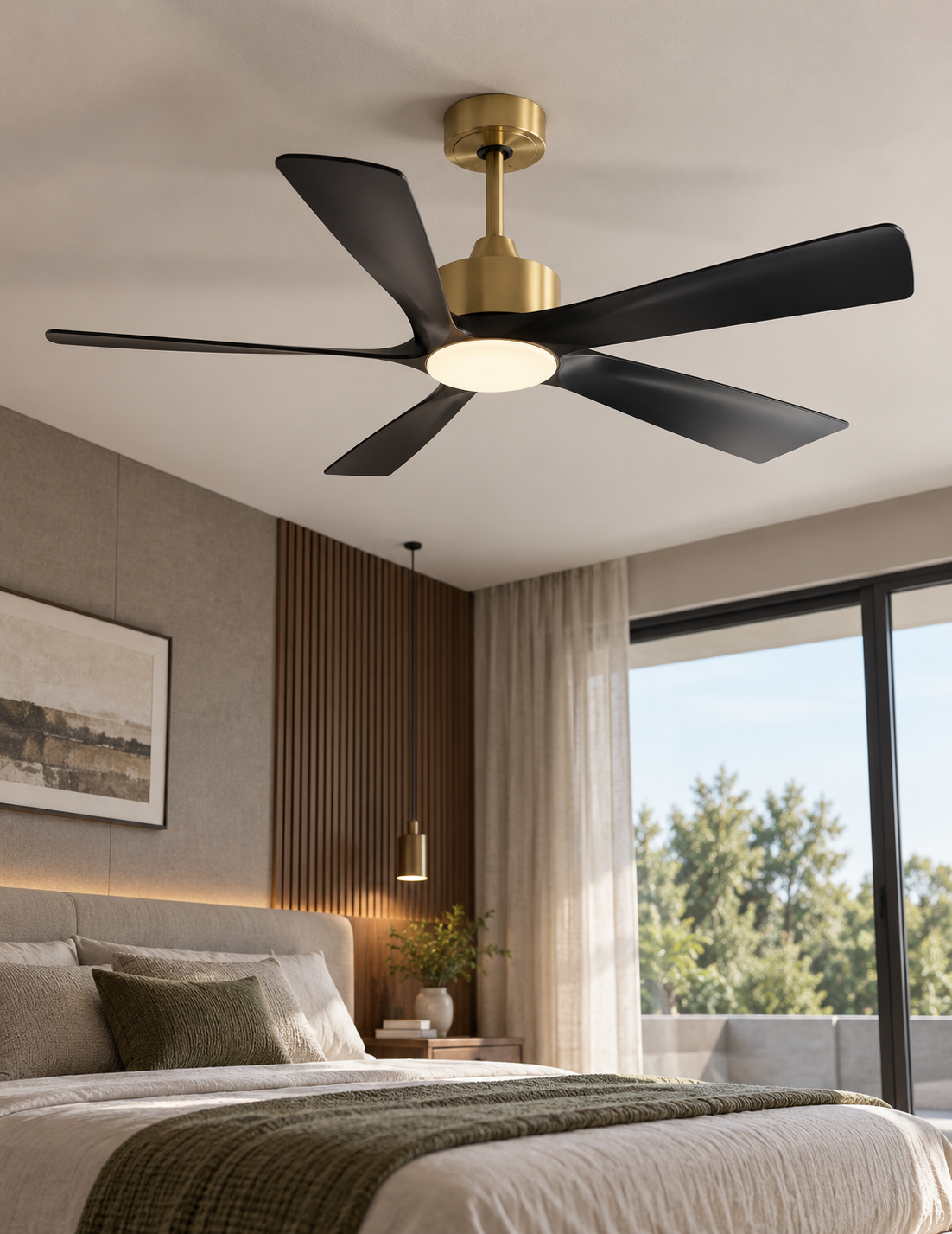 Black and gold ceiling fan with integrated light in a modern bedroom