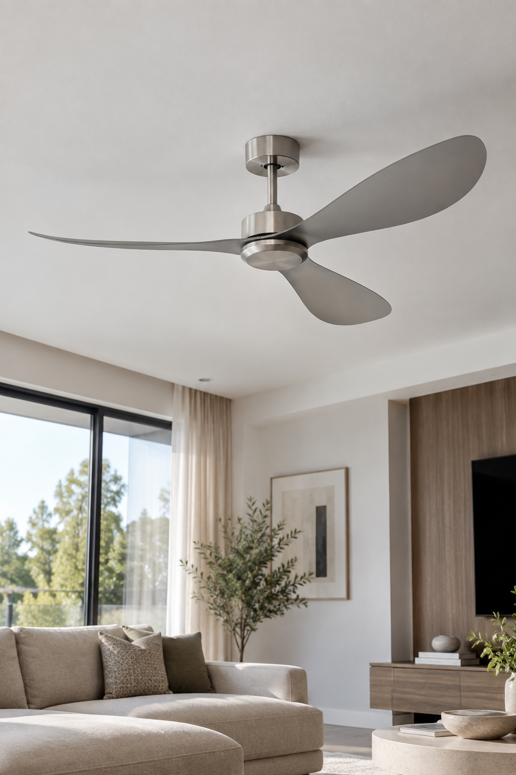 Modern brushed-metal ceiling fan in a contemporary living room
